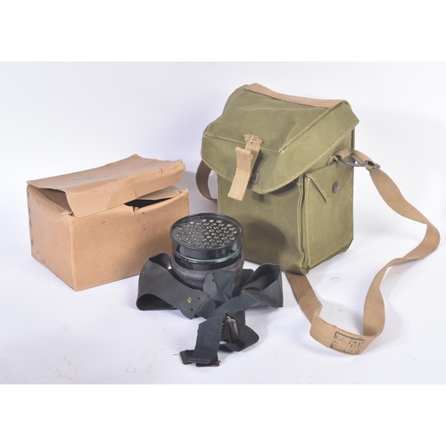 282 - Two WWII Second World War British Respirator Gas Masks and x2 steel helmets. Helmets comprising a 19... 