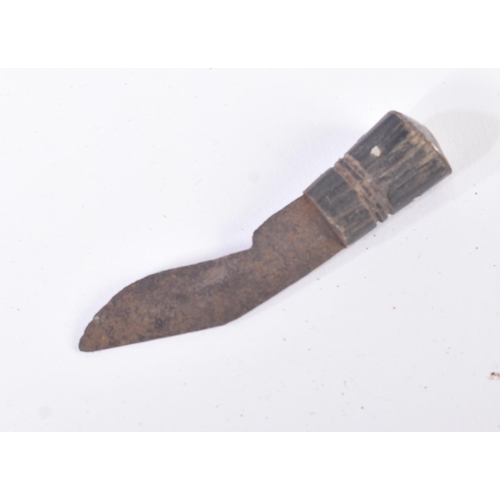 284 - A vintage Nepalese / Gurkha Regiment Kukri knife dagger. The knife having a pommel with diamond shap... 