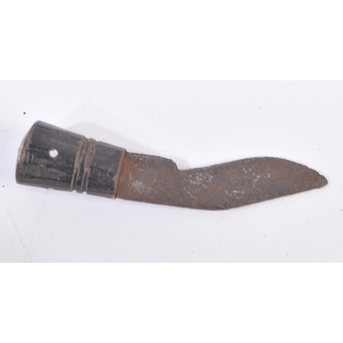 284 - A vintage Nepalese / Gurkha Regiment Kukri knife dagger. The knife having a pommel with diamond shap... 