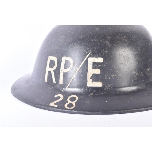 288 - A WWII Second World War British Home Front non-conductive composite helmet attributed to the repair ... 