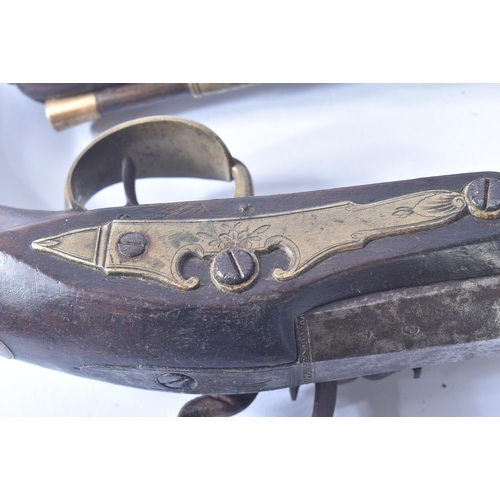 30 - A pair of late 18th Century John Probin of Birmingham made flintlock pistols. Rounded wooden butt wi... 