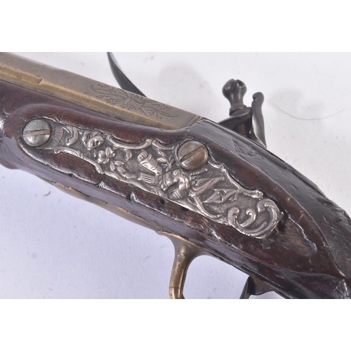 300 - A late 18th Century French flintlock pistol. Shaped brass trigger guard, with roundel to butt. Ramro... 