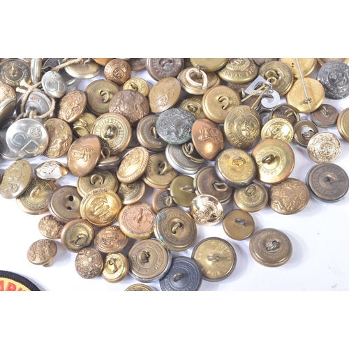 317 - A collection of assorted First and Second World War (and later) military uniform buttons and cloth p... 