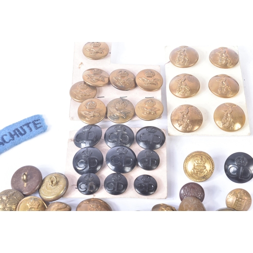 317 - A collection of assorted First and Second World War (and later) military uniform buttons and cloth p... 