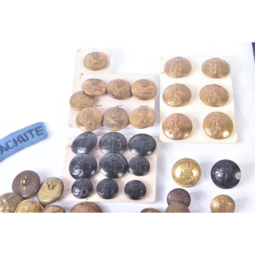 317 - A collection of assorted First and Second World War (and later) military uniform buttons and cloth p... 