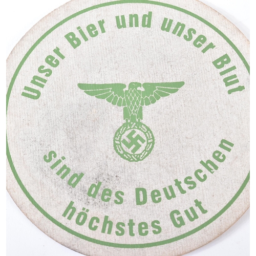 319 - A collection of x5 WWII Second World War Third Reich Nazi German beer mats. Various German slogans a... 