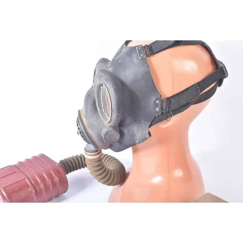 322 - Two WWII Second World War British Respirator Gas Masks comprising a General Civilian Respirator with... 