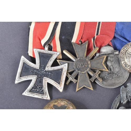 335 - A post WWII Second World War 1950s German Third Reich Denazified medal group. Medals comprising Iron... 