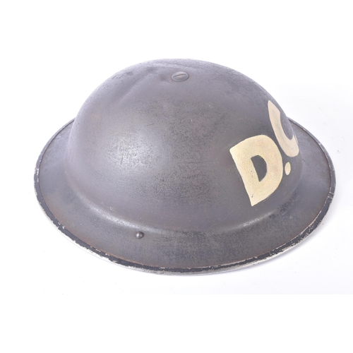 339 - A WWII Second World War British Home Front ' Damage Control ' brodie helmet. Typical form with a whi... 