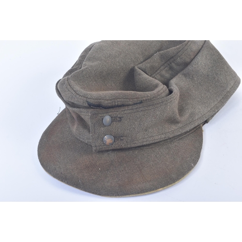 358 - A WWII Second World War Third Reich Nazi German M43 Wehrmacht forage cap. Khaki wool construction wi... 