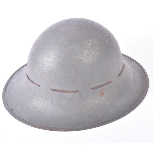 38 - A WWII Second World War British Home Front Zuckerman helmet denoting to ' Street Fire Party ' (S.F.P... 