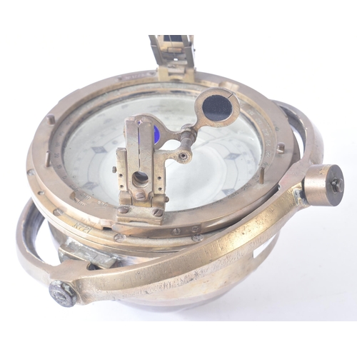 401 - A vintage maritime interest ships floating magnetic compass / gimbal. Heavy brass construction mount... 