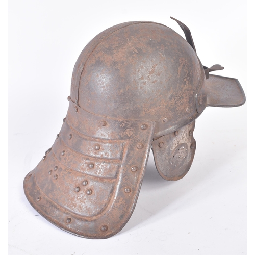 420 - A 19th Century copy of a post-Renaissance lobster-tailed pot helmet. The helmet having a rounded sku... 