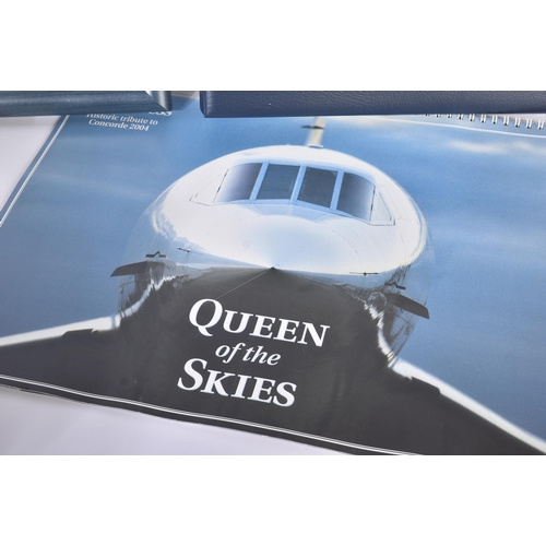 421 - A collection of assorted Concorde books and memorabilia to include; a folder containing 40th Anniver... 