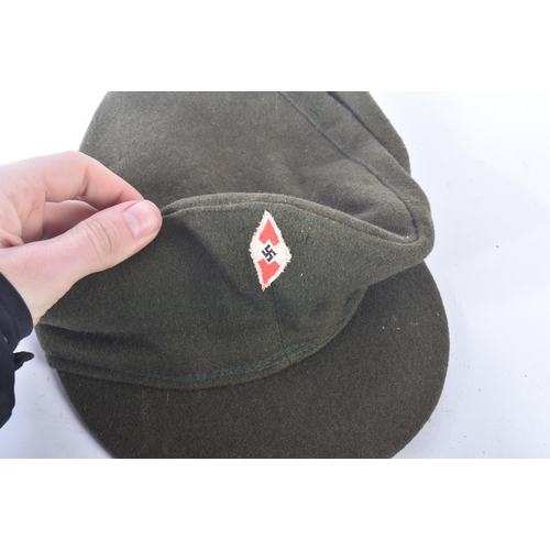 424 - A WWII Second World War Third Reich Nazi German Hitler Youth cap and a Reich Protection League armba... 