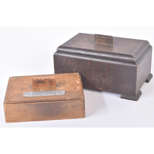 438 - Two WWII Second World War Third Reich Nazi German style wooden cigarette boxes. One with an applied ... 