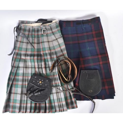 447 - Two vintage Scottish Highland style kilts along with x2 leather sporrans and a brown leather belt wi... 