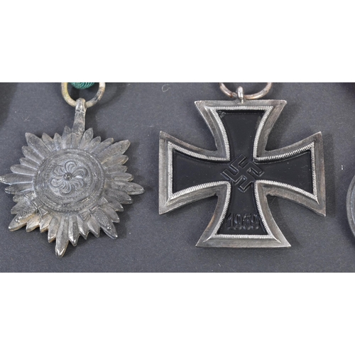 448 - A collection of assorted WWII Second World War Third Reich Nazi German medals comprising; Iron Cross... 