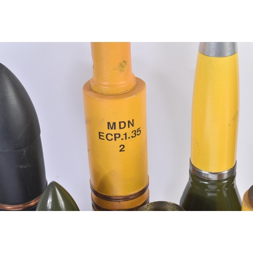 465 - A collection of assorted WWII Second World War and other period artillery shells and projectiles to ... 