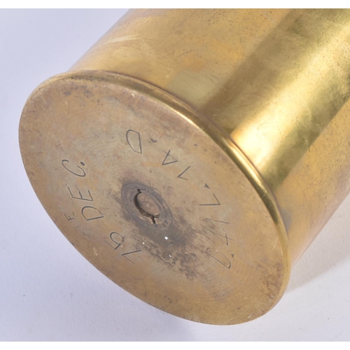 475 - A WWI First World War artillery projectile with fuse and brass shell case. The projectile inert and ... 