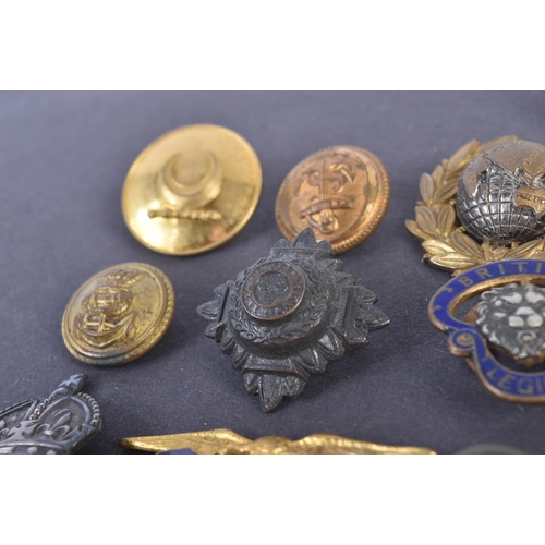 59 - A collection of assorted 20th Century (WWII and surrounding period) military related buttons, badges... 