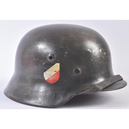 60 - An original WWII Second World War Third Reich Nazi German M35 Stahlhelm steel combat helmet. A doubl... 