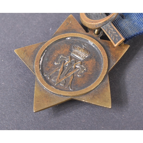 64 - A 19th Century Egypt Campaign Khedive's Star medal with Tokar clasp. The five-pointed bronze star sh... 