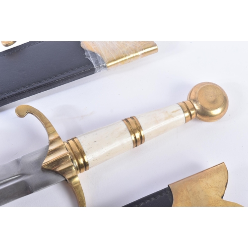 69 - Two contemporary replica ' Blackfriars Daggers '. Solid brass dome pommel hilt, polished bone grip a... 