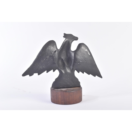 72 - A believed late 19th Century wooden Prussian Eagle statue / figurine mounted to a circular wooden ba... 