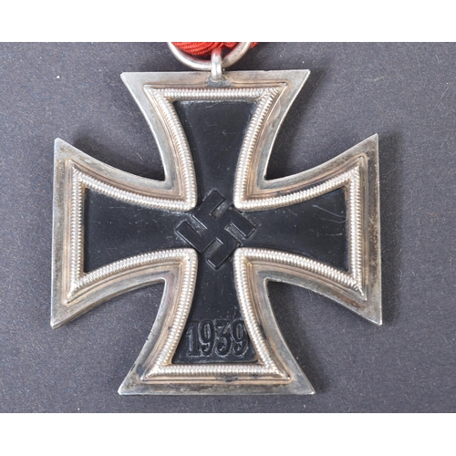 76 - A WWII Second World War Third Reich Nazi German Iron Cross medal. A Second Class example of two part... 