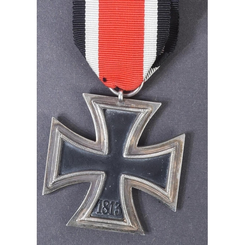 76 - A WWII Second World War Third Reich Nazi German Iron Cross medal. A Second Class example of two part... 