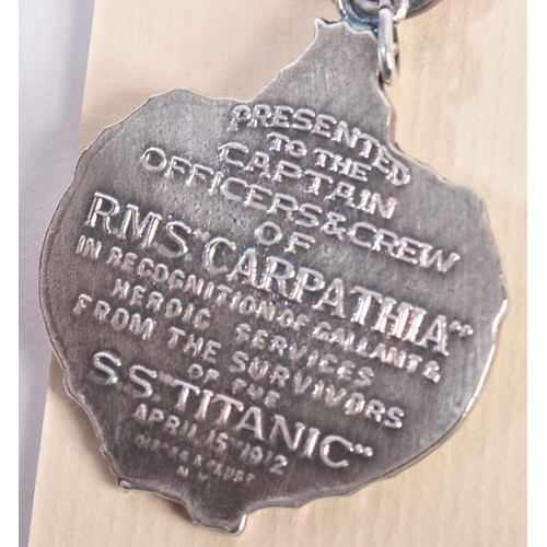 79 - RMS Carpathia - two replica Titanic disaster RMS Carpathia medals comprising a bronze and silver exa... 