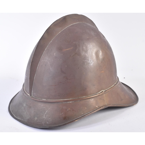 86 - A late 19th Century French Adrian helmet. The helmet of usual form split pin ' comb ' through the to... 