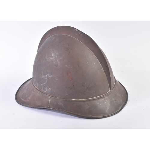 86 - A late 19th Century French Adrian helmet. The helmet of usual form split pin ' comb ' through the to... 