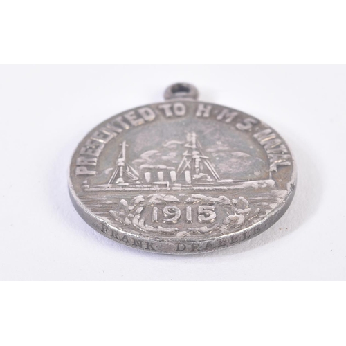 90 - HMS Natal Medal - a scarce original HMS Natal medal, dated 1915. Silver construction, the front feat... 