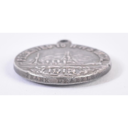 90 - HMS Natal Medal - a scarce original HMS Natal medal, dated 1915. Silver construction, the front feat... 