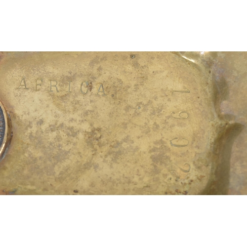 94 - A Boer War interest brass moulded tray with a fixed Royal South Lincolnshire Militia cap badge. Stam... 