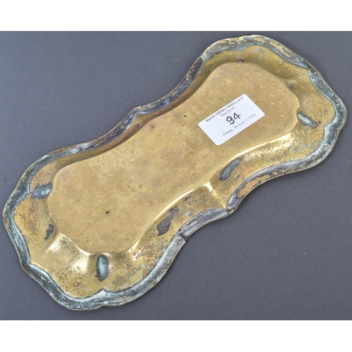 94 - A Boer War interest brass moulded tray with a fixed Royal South Lincolnshire Militia cap badge. Stam... 