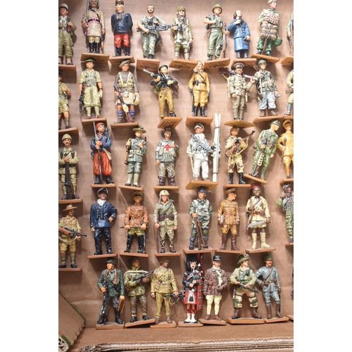 95 - A large collection of assorted Del Prado ' Men At War ' model figures / figurines with accompanying ... 