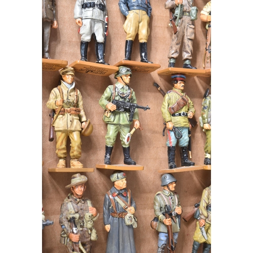 95 - A large collection of assorted Del Prado ' Men At War ' model figures / figurines with accompanying ... 