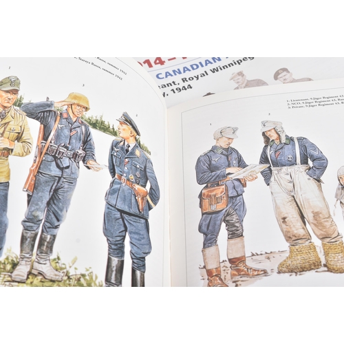 95 - A large collection of assorted Del Prado ' Men At War ' model figures / figurines with accompanying ... 