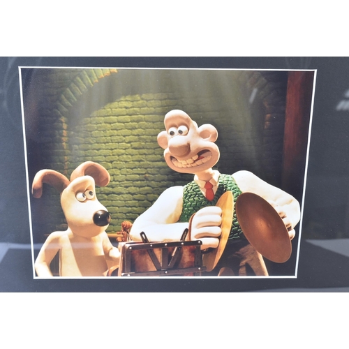 54 - Wallace & Gromit - Nick Park (creator) - sketch of Gromit in black ink, signed. Undedicated. Mounted... 