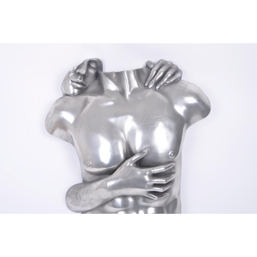 32 - Compulsion Gallery Of Bromley - A contemporary pewter layered life size embraced couple wall hanging... 