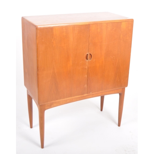 30 - A retro vintage mid 20th Century 1960s Danish teak cocktail drinks cabinet having two full length do... 