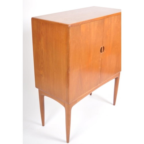 30 - A retro vintage mid 20th Century 1960s Danish teak cocktail drinks cabinet having two full length do... 