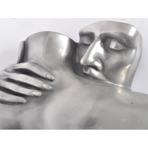 31 - Compulsion Gallery Of Bromley - A contemporary pewter layered life size embraced couple wall hanging... 