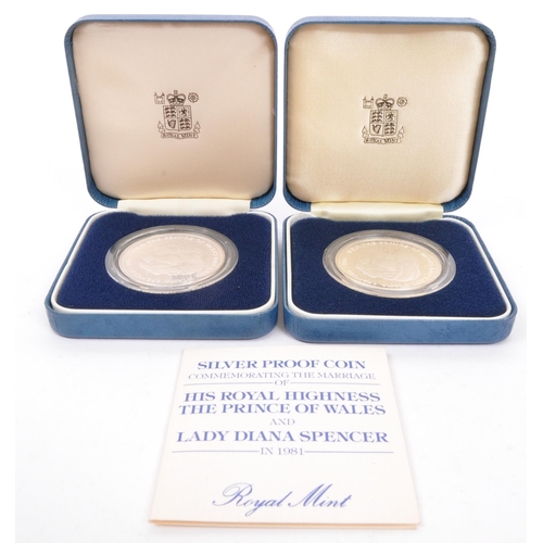 549 - A pair of 925 sterling silver 1981 proof coin commemorating the marriage of His Royal Highness and L... 
