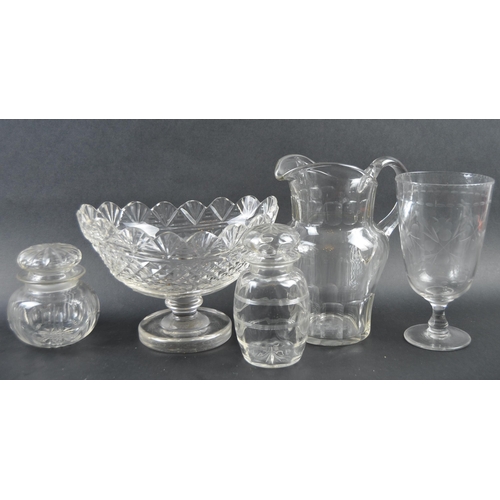 192 - A collection of 19th Century cut glassware to include a large pitcher jug, large conical bowl vase /... 
