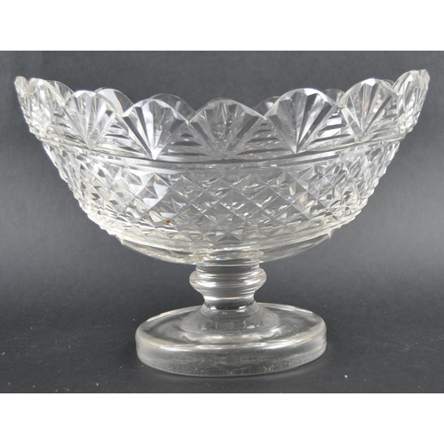 192 - A collection of 19th Century cut glassware to include a large pitcher jug, large conical bowl vase /... 
