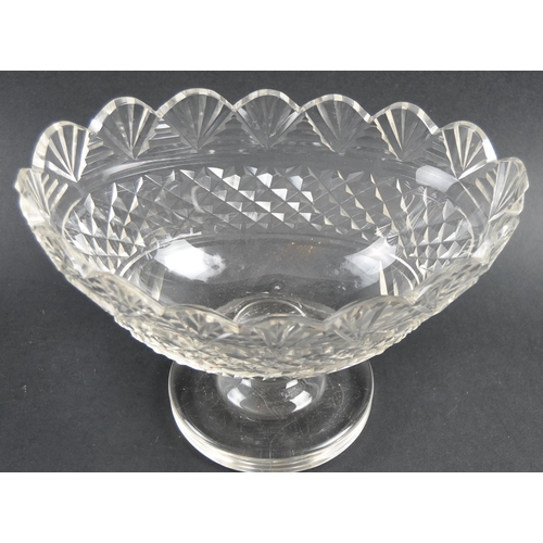 192 - A collection of 19th Century cut glassware to include a large pitcher jug, large conical bowl vase /... 